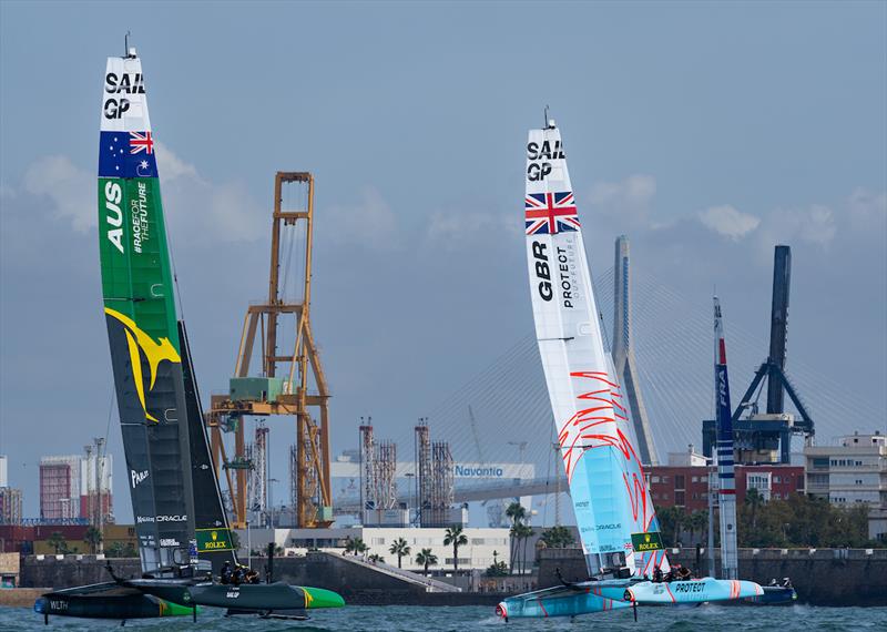 Australia SailGP Team helmed by Tom Slingsby and Great Britain SailGP Team helmed by Ben Ainslie on Race Day 2 of the Spain Sail Grand Prix in Cadiz - photo © Bob Martin for SailGP