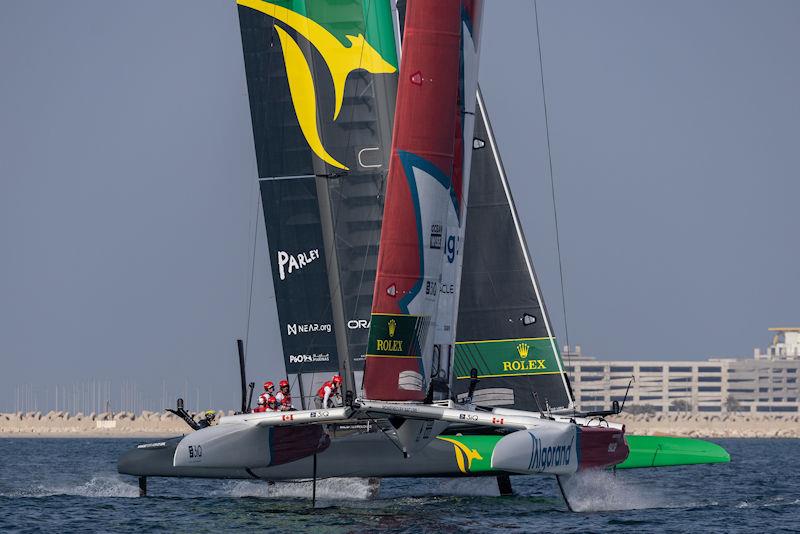 Canada SailGP Team helmed by Phil Robertson cross paths with Australia SailGP Team helmed by Tom Slingsby during a practice session ahead of the Dubai Sail Grand Prix presented by P&O Marinas in Dubai, United Arab Emirates photo copyright Felix Diemer for SailGP taken at  and featuring the F50 class