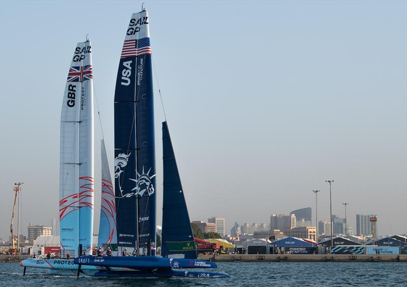 USA SailGP Team helmed by Jimmy Spithill and Great Britain SailGP Team helmed by Ben Ainslie sail closely together during the final race on on Race Day 1 of the Dubai Sail Grand Prix presented by P&O Marinas in Dubai, United Arab Emirates photo copyright Ricardo Pinto for SailGP taken at  and featuring the F50 class