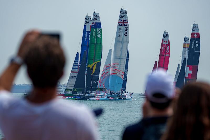Spectators watch from the Beach Front Fan Zone as the F50 fleet races at the start of the first race on Race Day 1 of the Singapore Sail Grand Prix presented by the Singapore Tourism Board - photo © Bob Martin for SailGP