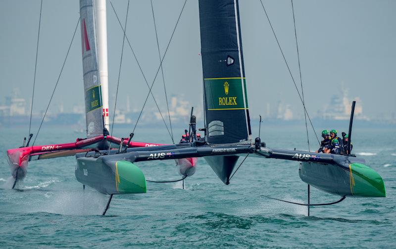 Australia SailGP Team helmed by Tom Slingsby ahead of Denmark SailGP Team presented by ROCKWOOL helmed by Nicolai Sehested on Race Day 1 of the Singapore Sail Grand Prix presented by the Singapore Tourism Board - photo © Bob Martin for SailGP