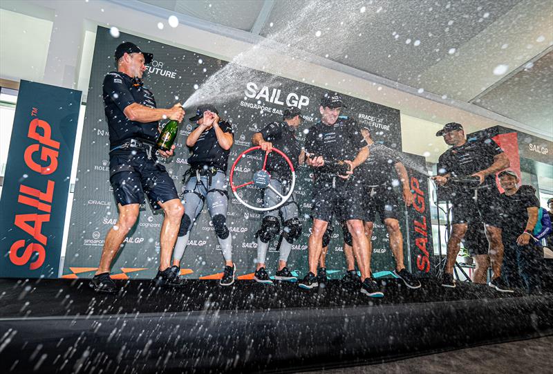 The New Zealand SailGP Team spray Champagne Barons de Rothschild in the Adrenaline Lounge to celebrate their win of the Singapore Sail Grand Prix  - photo © Eloi Stichelbaut/SailGP.