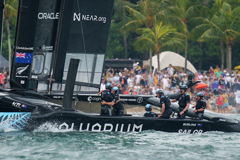 New Zealand SailGP crew celebrate as tgheuy cross the finish line to win the final race on Race Day 2 of the Singapore Sail Grand Prix presented by the Singapore Tourism Board - photo © Bob Martin for SailGP