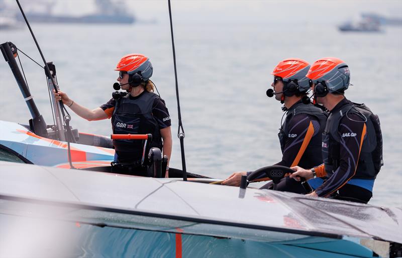 Hannah Mills, Ben Ainslie and Iain Jensen wait for the winds to pick up as the start of racing has ben postponed on Race Day 1 of the Singapore Sail Grand Prix presented by the Singapore Tourism Board - photo © Ian Walton for SailGP