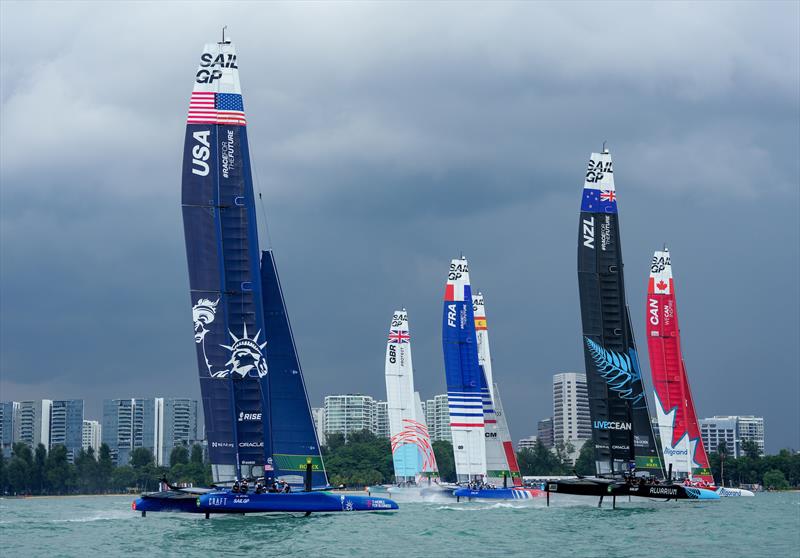 USA, New Zealand SailGP Team and Canada SailGP Team during a practice session with the city in the background ahead of the Singapore Sail Grand Prix  photo copyright Bob Martin/SailGP taken at Singapore Yacht Club and featuring the F50 class