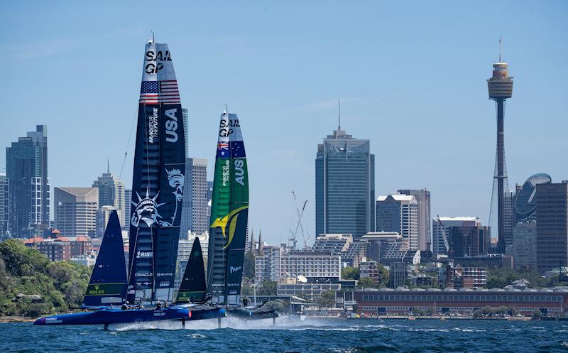 USA SailGP Team helmed by Jimmy Spithill and Australia SailGP Team helmed by Tom Slingsby race side by side in front of the city skyline during a practice session ahead of the KPMG Australia Sail Grand Prix photo copyright Bob Martin for SailGP taken at  and featuring the F50 class