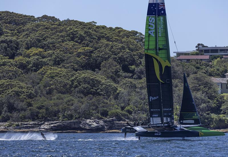 Sunrise sports presenter Mark Beretta water skiing behind the Australia SailGP Team F50 catamaran during a practice session ahead of the KPMG Australia Sail Grand Prix in Sydney, Australia. Thursday 16th February . Photo: Felix Diemer for SailGP photo copyright Felix Diemer for SailGP taken at  and featuring the F50 class