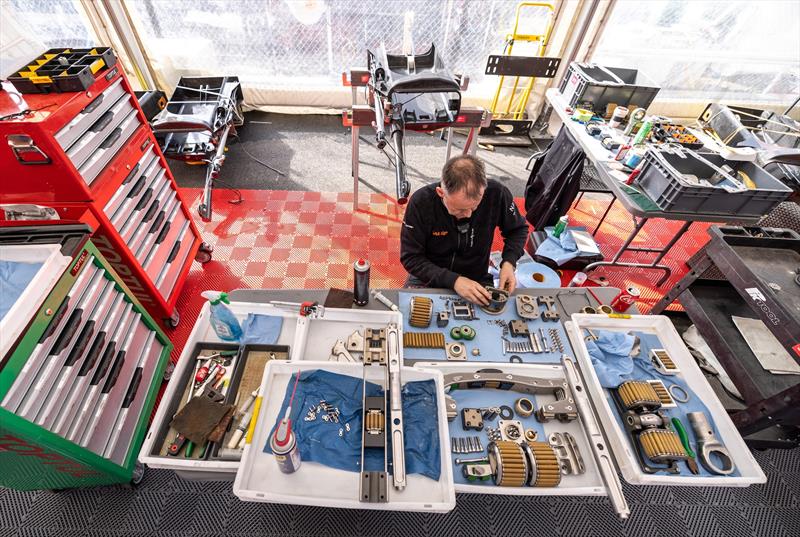 A member of the SailGP technical team works on the hydraulic components of the F50 catamarans in the technical area ahead of the ITM New Zealand Sail Grand Prix  - photo © Felix Diemer/SailGP