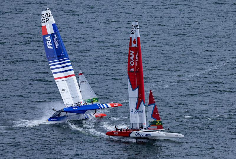 Close racing between France SailGP Team helmed by Quentin Delapierre and Canada SailGP Team helmed by Phil Robertson on Race Day 1 of the Mubadala SailGP Season 3 Grand Final in San Francisco, USA photo copyright Jed Jacobsohn for SailGP taken at  and featuring the F50 class