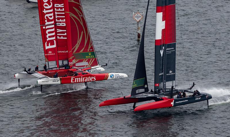 Emirates Great Britain SailGP Team helmed by Ben Ainslie and Switzerland SailGP Team helmed by Sebastien Schneiter in action on Race Day 2 of the Oracle Los Angeles Sail Grand Prix at the Port of Los Angeles, in California, USA photo copyright Felix Diemer for SailGP taken at  and featuring the F50 class