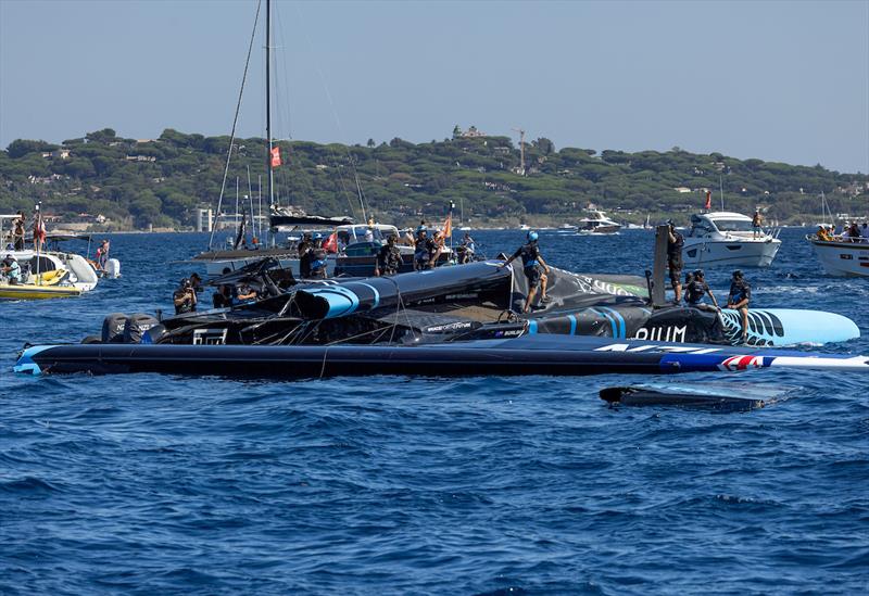 New Zealand SailGP Team view the damage to their F50 catamaran after Race 3 on Race Day 1 of the France Sail Grand Prix in Saint-Tropez, France photo copyright Felix Diemer/SailGP taken at  and featuring the F50 class