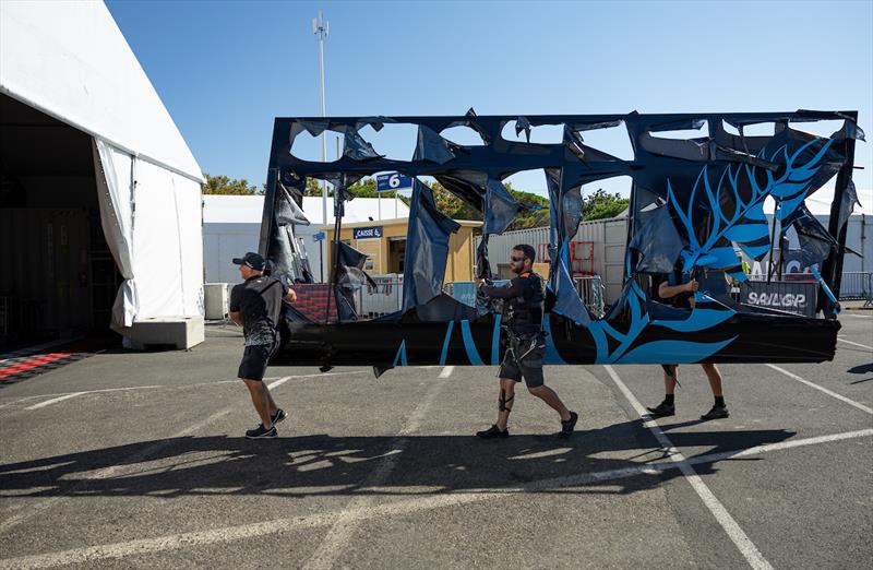 New Zealand SailGP Team members carry the damaged wing back to the team hangar on Race Day 1 of the France Sail Grand Prix in Saint-Tropez, France. Sept 9, 2023 photo copyright Ian Walton/SailGP taken at  and featuring the F50 class