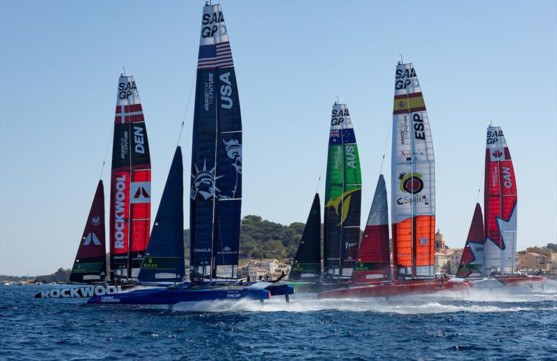 The SailGP F50 catamaran sail past the bell tower and old town of Saint-Tropez on Race Day 2 of the France Sail Grand Prix in Saint-Tropez photo copyright Felix Diemer for SailGP taken at  and featuring the F50 class