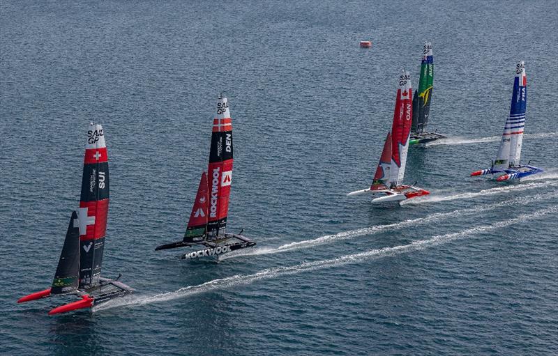 Switzerland SailGP Team helmed by Sebastien Schneiter lead the rest of the SailGP fleet ahead of the ROCKWOOL Italy Sail Grand Prix in Taranto, Italy photo copyright Felix Diemer for SailGP taken at  and featuring the F50 class