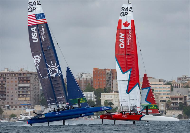 USA SailGP Team helmed by Jimmy Spithill and Canada SailGP Team helmed by Phil Robertson in action on Race Day 1 of the ROCKWOOL Italy Sail Grand Prix in Taranto, Italy - photo © Bob Martin for SailGP