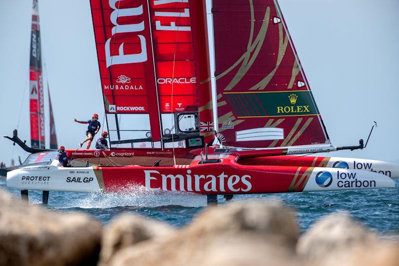 Iain Jensen, wing trimmer of Emirates Great Britain SailGP Team, runs across the boat on Race Day 2 of the ROCKWOOL Italy Sail Grand Prix in Taranto, Italy photo copyright Ricardo Pinto for SailGP taken at  and featuring the F50 class