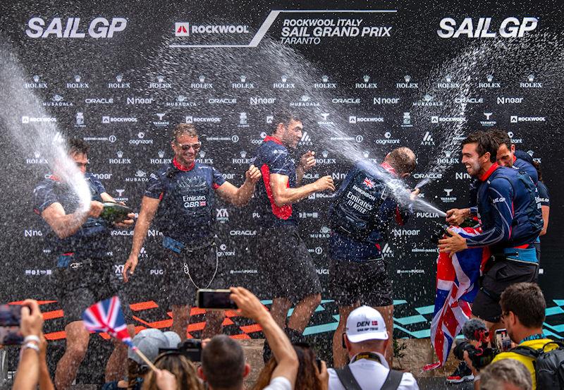 Emirates Great Britain SailGP Team spray Barons De Rothschild Champagne as they celebrate on stage in the Adrenaline Lounge, in Castello Aragonese, after winning the ROCKWOOL Italy Sail Grand Prix in Taranto, Italy photo copyright Ricardo Pinto for SailGP taken at  and featuring the F50 class