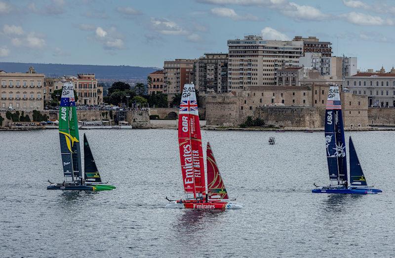 USA SailGP Team helmed by Jimmy Spithill lead Emirates Great Britain SailGP Team helmed by Ben Ainslie and Australia SailGP Team helmed by Tom Slingsby on Race Day 2 of the ROCKWOOL Italy Sail Grand Prix in Taranto, Italy - photo © Felix Diemer for SailGP