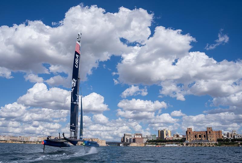 USA SailGP Team helmed by Jimmy Spithill sail toward the SailGP Race Stadium and Taranto Palazzo del Governo on Race Day 2 of the ROCKWOOL Italy Sail Grand Prix in Taranto, Italy photo copyright Bob Martin for SailGP taken at  and featuring the F50 class