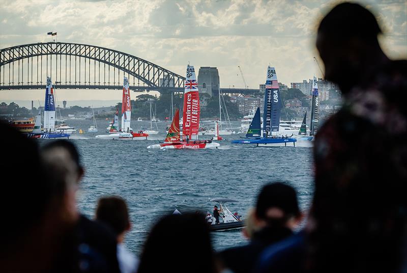 The fleet sail past Sydney Harbour Bridge as on Race Day 1 of the KPMG Australia Sail Grand Prix in Sydney, Australia - photo © Patrick Hamilton for SailGP