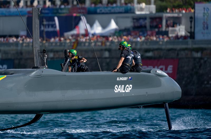 Nina Curtis, strategist of Australia SailGP Team, on the grinding handles on Australia SailGP Team helmed by Tom Slingsby in action on Race Day 2 of the Spain Sail Grand Prix in Cadiz, Spain - photo © Bob Martin for SailGP