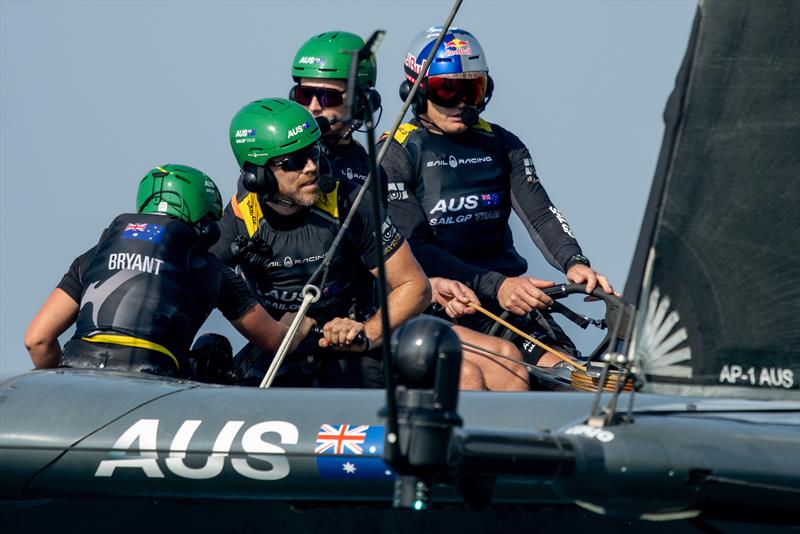 Jimmy Spithill, interim driver of Australia SailGP Team, at the wheel behind Kyle Langford, wing trimmer of Australia SailGP Team - Day 1 SailGP Dubai - photo © Ricardo Pinto/SailGP