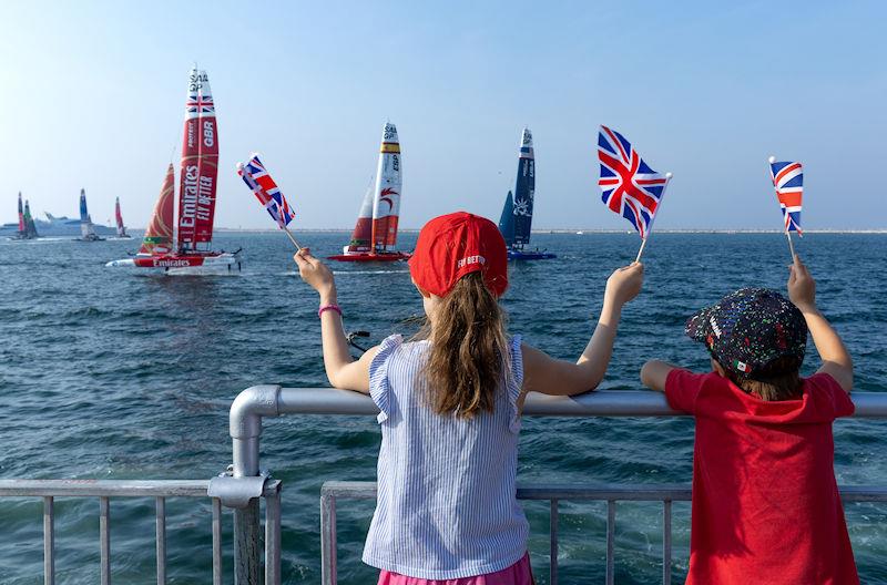 Young SailGP spectators supporting Emirates Great Britain SailGP Team helmed by Ben Ainslie on Race Day 1 of the Emirates Sail Grand Prix presented by P&O Marinas in Dubai, United Arab Emirates - photo © Kieran Cleeves for SailGP