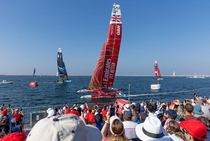 Emirates Great Britain SailGP Team helmed by Ben Ainslie passes the Race Stadium in the first race of Race Day 2 of the Emirates Sail Grand Prix presented by P&O Marinas in Dubai, United Arab Emirates - photo © Kieron Cleeves for SailGP