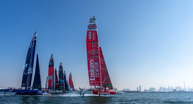 Emirates Great Britain SailGP Team are disqualified after a close encounter with the USA SailGP Team as the fleet cross the start line on Race Day 2 of the Emirates Sail Grand Prix presented by P&O Marinas in Dubai, United Arab Emirates - photo © Bob Martin for SailGP