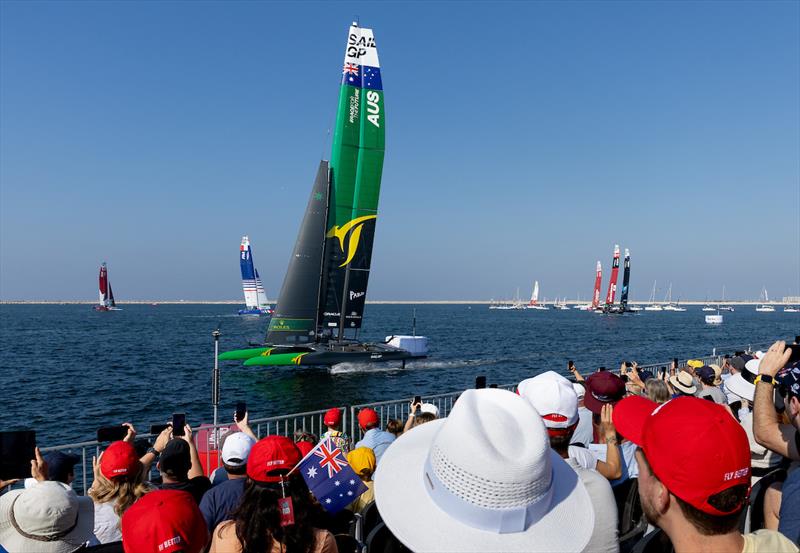 Spectators watch as Australia SailGP Team helmed by interim driver Jimmy Spithill passes the Race Stadium on Race Day 2 of the Emirates Sail Grand Prix presented by P&O Marinas in Dubai, United Arab Emirates - photo © Kieron Cleeves for SailGP