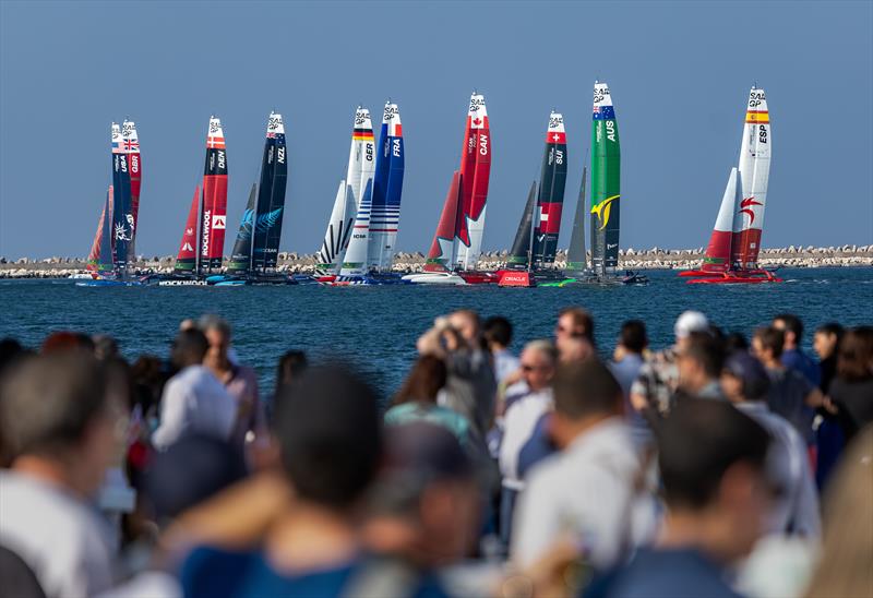 USA SailGP Team luff Emirates Great Britain SailGP Team on the start on Race Day 2 of the Emirates Sail Grand Prix presented by P&O Marinas in Dubai, United Arab Emirates photo copyright Kieran Cleeves for SailGP taken at  and featuring the F50 class
