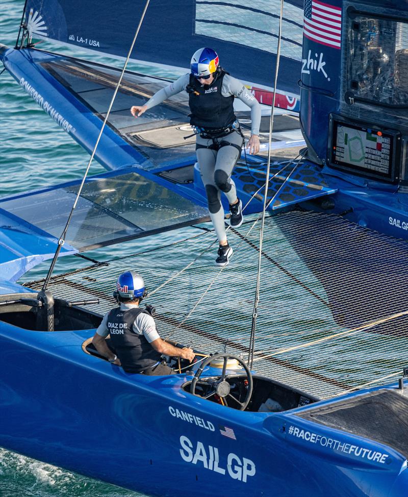 Sara Stone, strategist of USA SailGP Team, crosses the boat on Race Day 1 of the Mubadala Abu Dhabi Sail Grand Prix presented by Abu Dhabi Sports Council photo copyright Ricardo Pinto for SailGP taken at  and featuring the F50 class