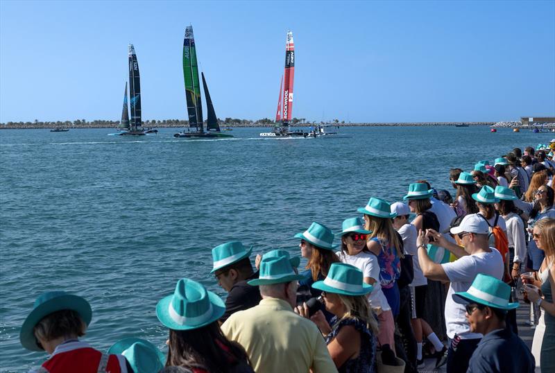 ROCKWOOL Denmark SailGP Team helmed by interim driver Nathan Outteridge, Australia SailGP Team helmed by Tom Slingsby and New Zealand SailGP Team helmed by Peter Burling pass spectators on shore on Race Day 1 Abu Dhabi Sail Grand Prix13th January photo copyright Christopher Pike taken at Abu Dhabi Sailing & Yacht Club and featuring the F50 class