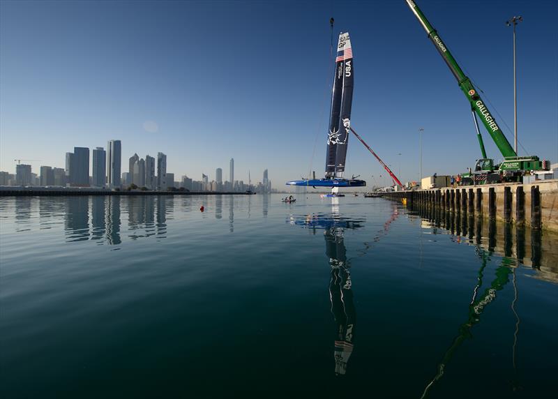 USA SailGP Team F50 catamaran is craned into the water on Race Day 2 of the Mubadala Abu Dhabi Sail Grand Prix presented by Abu Dhabi Sports Council photo copyright Ricardo Pinto for SailGP taken at  and featuring the F50 class