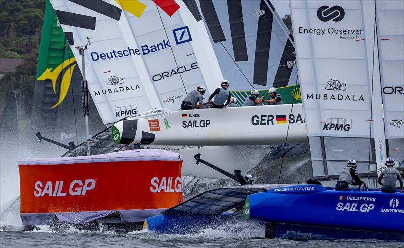 Germany SailGP Team save a capsize as they sail past a course marker alongside France SailGP Team on Race Day 1 of the KPMG Australia Sail Grand Prix in Sydney - February 24, 2024 photo copyright Felix Diemer/SailGP taken at Woollahra Sailing Club and featuring the F50 class
