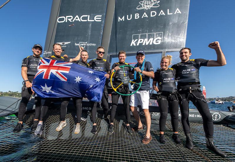 Australia SailGP Team celebrate their victory with the national flag as Martin Sheppard, National Chairman of KPMG Australia presents them with the winners trophy after the final race of the KPMG Australia Sail Grand Prix in Sydney, Australia photo copyright Ricardo Pinto for SailGP taken at  and featuring the F50 class