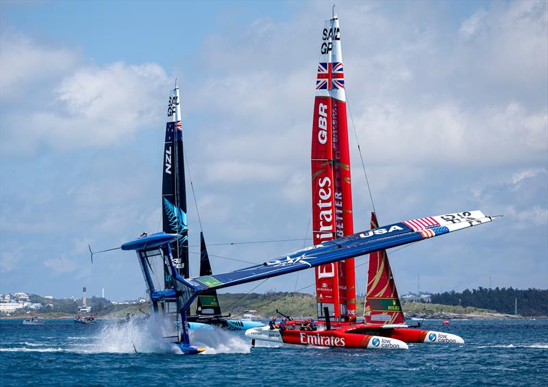 USA SailGP Team capsize as they sail closely past Emirates Great Britain SailGP Team and New Zealand SailGP Team during a practise session ahead of the Apex Group Bermuda Sail Grand Prix in Bermuda - May 3, 2024 - photo © Felix Diemer/SailGP