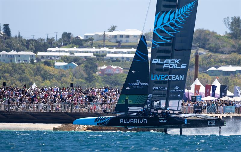 Live Ocean (NZL) pass the SailGP Race Stadium and grandstand on Race Day 1 of the Apex Group Bermuda Sail Grand Prix - May 4, 2024 photo copyright Samo Vidic/SailGP taken at Royal Bermuda Yacht Club and featuring the F50 class
