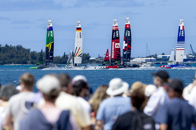 Australia SailGP Team, Germany SailGP Team, ROCKWOOL Denmark SailGP Team, Switzerland SailGP Team and France SailGP Team pass spectators in the Race Stadium on Race Day 1 of the Apex Group Bermuda Sail Grand Prix photo copyright Kieran Cleeves for SailGP taken at  and featuring the F50 class