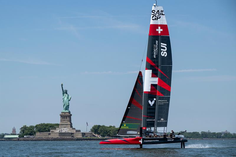 Switzerland SailGP Team helmed by Nathan Outteridge in action a they sail past the Statue of Liberty during a practice session ahead of the Mubadala New York Sail Grand Prix in New York, USA - photo © Ricardo Pinto for SailGP