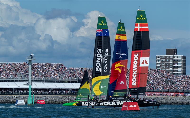 Spain SailGP Team helmed by Diego Botin, ROCKWOOL Denmark SailGP Team helmed by Nicolai Sehested and BONDS Flying Roos SailGP Team helmed by Tom Slingsby sail pst the Grandstand on Race Day 1 of the Emirates Great Britain Sail Grand Prix - photo © Ricardo Pinto for SailGP