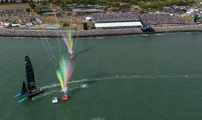 The pyrotechnics go off as New Zealand SailGP Team helmed by Peter Burling cross the finishing to win the Emirates Great Britain Sail Grand Prix in Portsmouth, UK - photo © Simon Bruty for SailGP