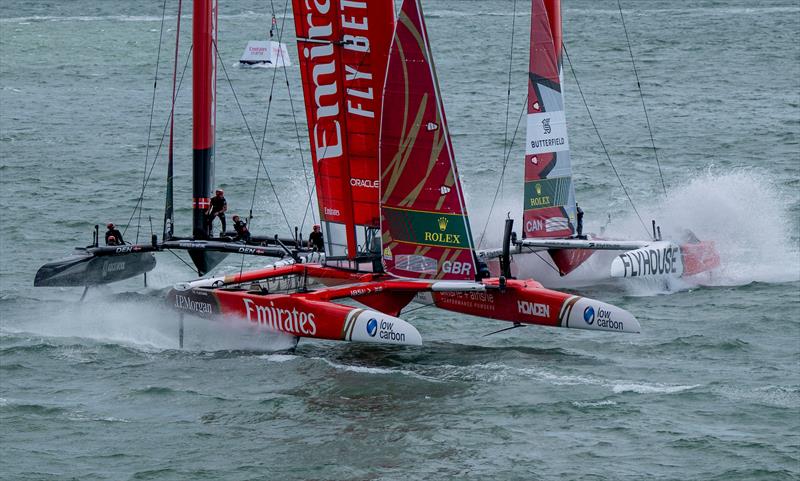 Emirates Great Britain SailGP Team helmed by Dylan Fletcher in close action with ROCKWOOL Denmark SailGP Team helmed by Nicolai Sehested and Canada NorthStar SailGP Team helmed by Giles Scott on Race Day 2 of the Emirates Great Britain Sail Grand Prix - photo © Jason Ludlow for SailGP