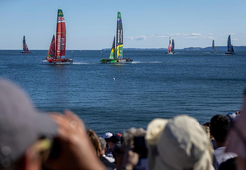Emirates Great Britain SailGP Team helmed by Dylan Fletcher leads BONDS Flying Roos SailGP Team helmed by Tom Slingsby pass the grandstand whilst in action on Race Day 2 of the Germany Sail Grand Prix in Sassnitz, Germany. Sunday 17 August - photo © Kieran Cleeves for SailGP