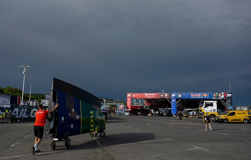 Members of the technical team start the breakdown in the technical area after racing cancelled for Day 2 - Rockwool France SailGP - September 13, 2025 - Saint-Tropez - photo © Jonathan Nackstrand/SailGP