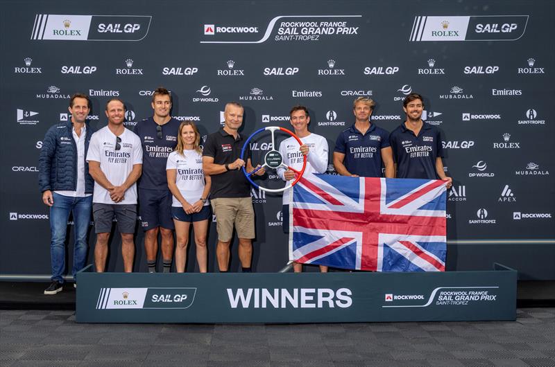 Emirates Great Britain SailGP Team are presented with the trophy by Thomas Kahler, ROCKWOOL chairman and CEO, as they are announced as winners after racing on the second day is cancelled due to storm warnings at the ROCKWOOL France Sail Grand Prix - photo © Felix Diemer for SailGP