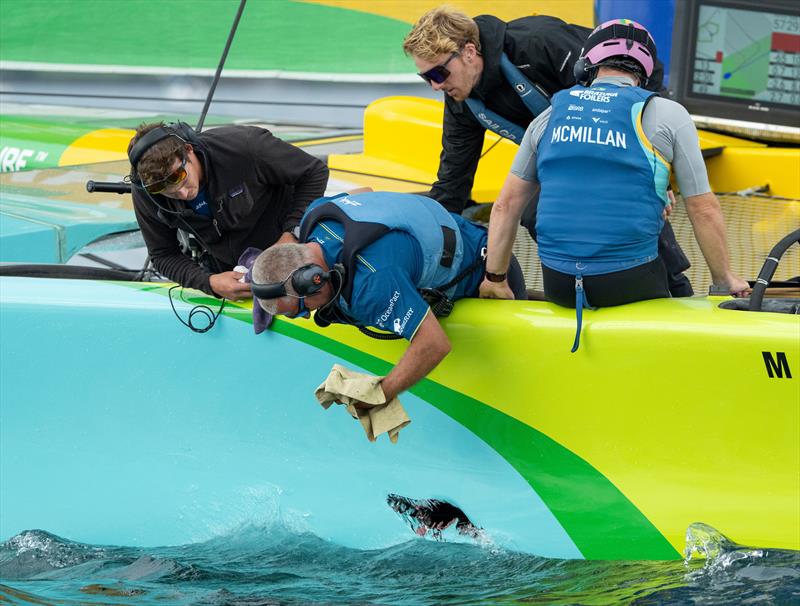 The Tech Team put a temporary patch on Brazil  -  Race Day 2 of the Rolex Switzerland Sail Grand Prix -  Geneva, Switzerland - September 21, 2025 - photo © Ricardo Pinto/SailGP