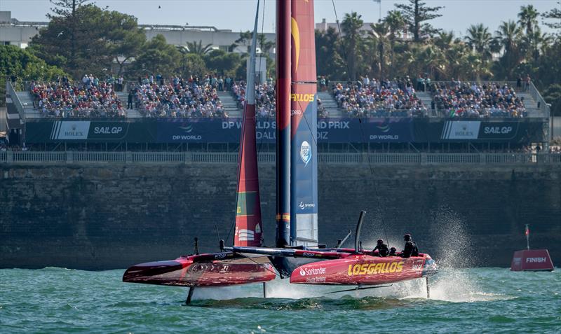 Spain SailGP Team helmed by Diego Botin passes the seawall and grandstand in the SailGP Race Stadium on Race Day 1 of the DP World Spain Sail Grand Prix photo copyright Ricardo Pinto for SailGP taken at  and featuring the F50 class
