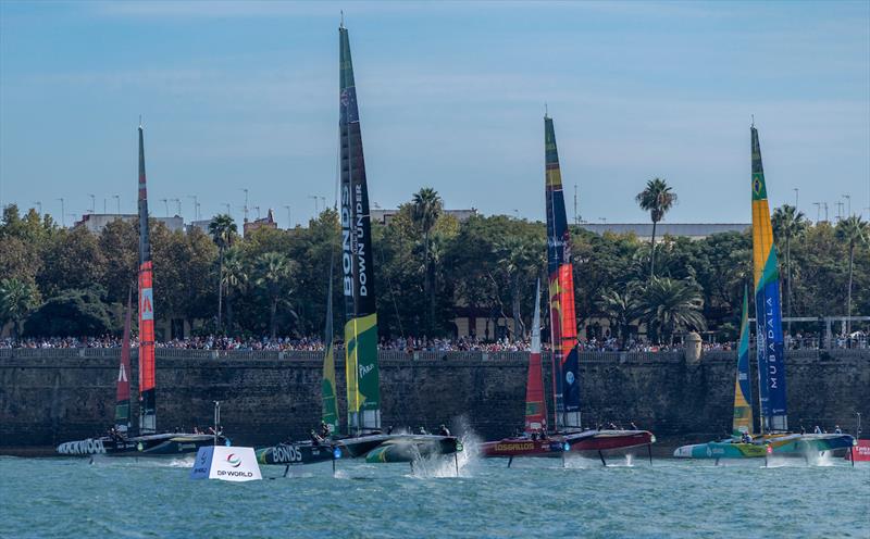 ROCKWOOL Denmark SailGP Team, Spain SailGP Team, BONDS Flying Roos SailGP Team and Mubadala Brazil SailGP Team as they race past the seawall lined with spectators on Race Day 2 of the DP World Spain Sail Grand Prix held in Cadiz, Spain Sunday 5 October - photo © Felix Diemer for SailGP
