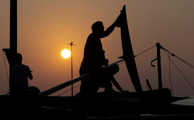 SailGP technical team cleaning the Switzerland SailGP Team F50 catamaran, at the end of Race Day 1 of the Mubadala Abu Dhabi Sail Grand Prix Season Grand Final presented by Abu Dhabi Sports Council - photo © Christopher Pike for SailGP